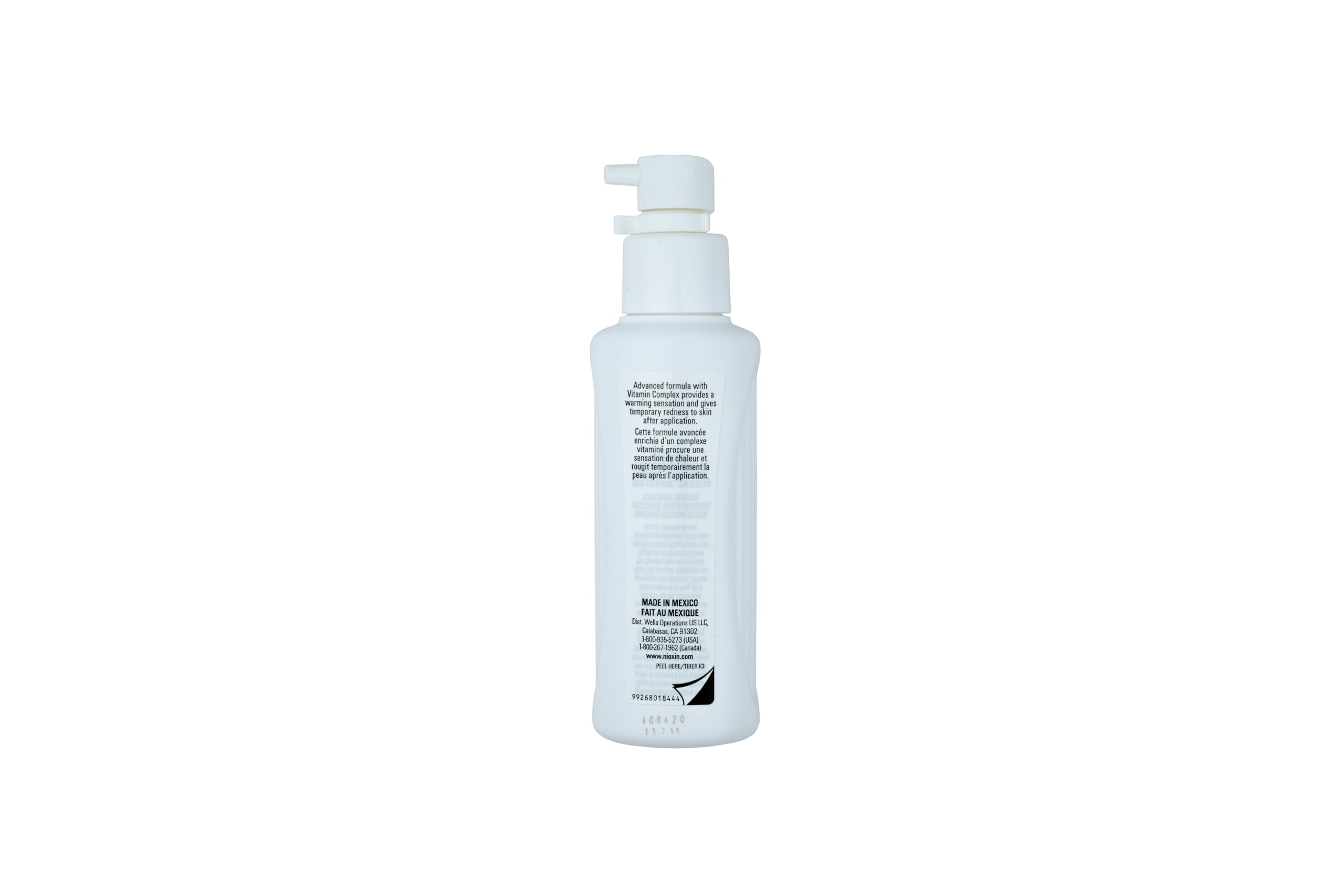Nioxin on bathroom shelf in lifestyle setting signaling easy daily routine integration