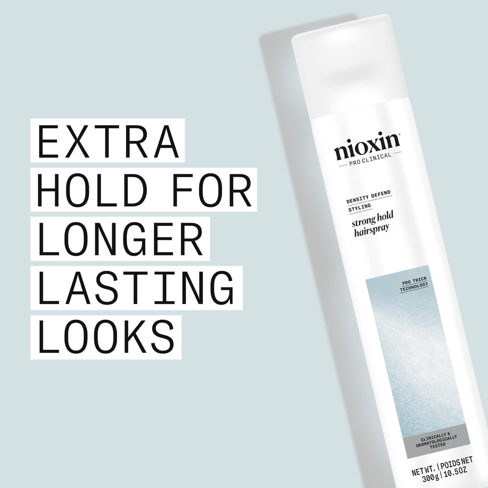NIOXIN spray settling in hair strands illustrating texture control and natural movement