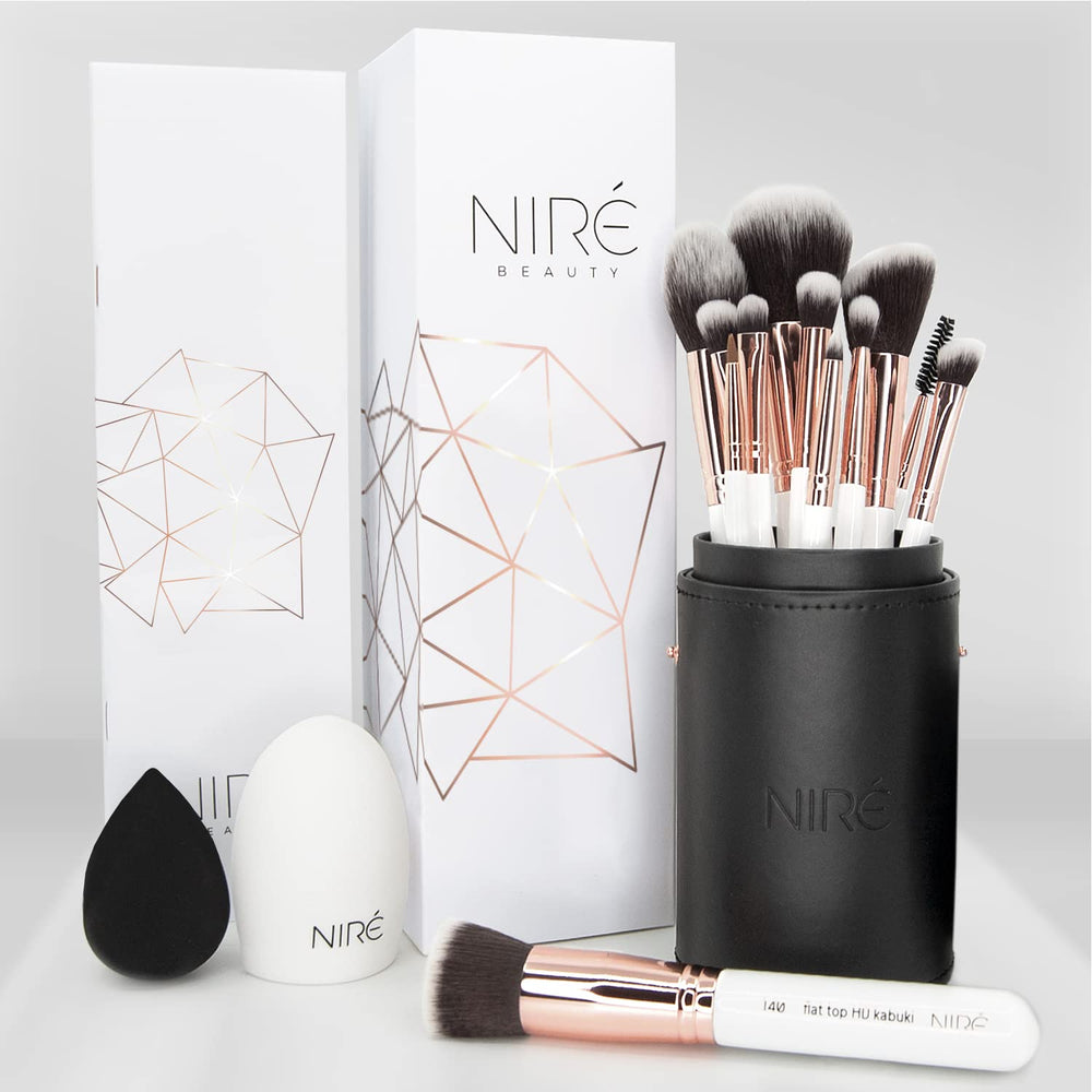 Niré Beauty White 15piece brush set case, organized for on-the-go makeup routines.