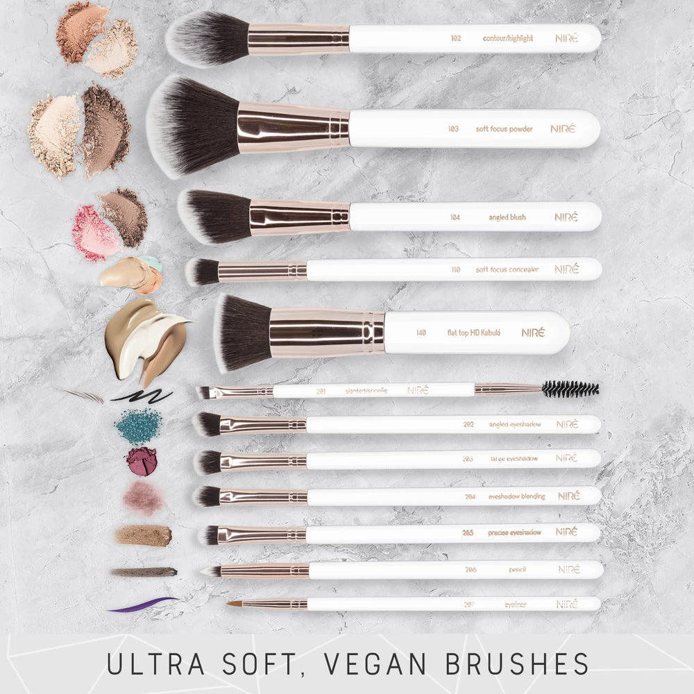 Niré Beauty White brush brushes closeup highlighting soft bristles for flawless application.