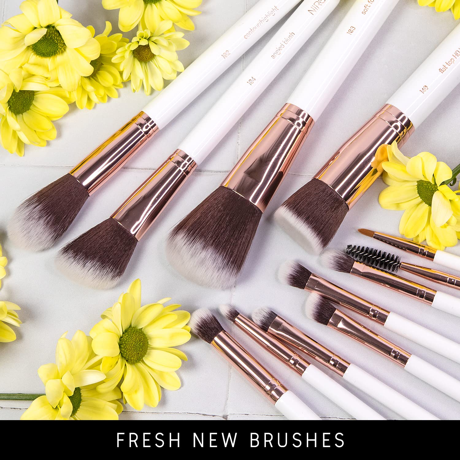 Niré Beauty White professional brush set on display emphasizes premium quality.
