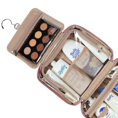 NISHEL travel toiletry bag interior compartments with mesh pouches keep bottles upright.
