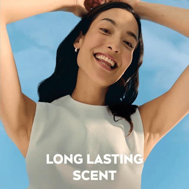NIVEA roll-on being applied to underarm area.