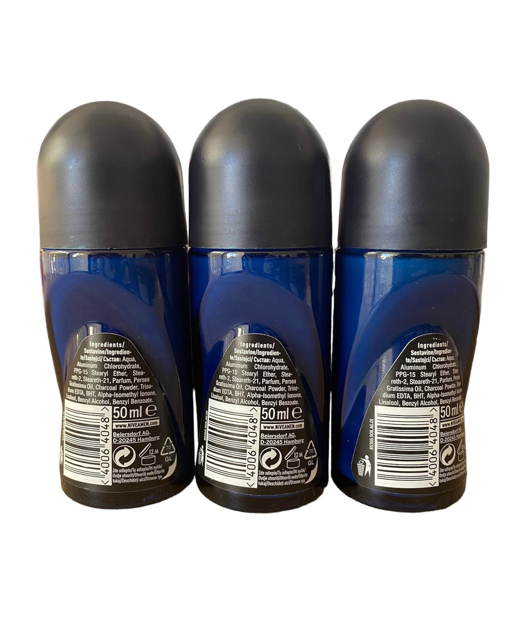 Close-up of NIVEA Men Dimension dark wood espresso bottle showing alcohol-free protection.