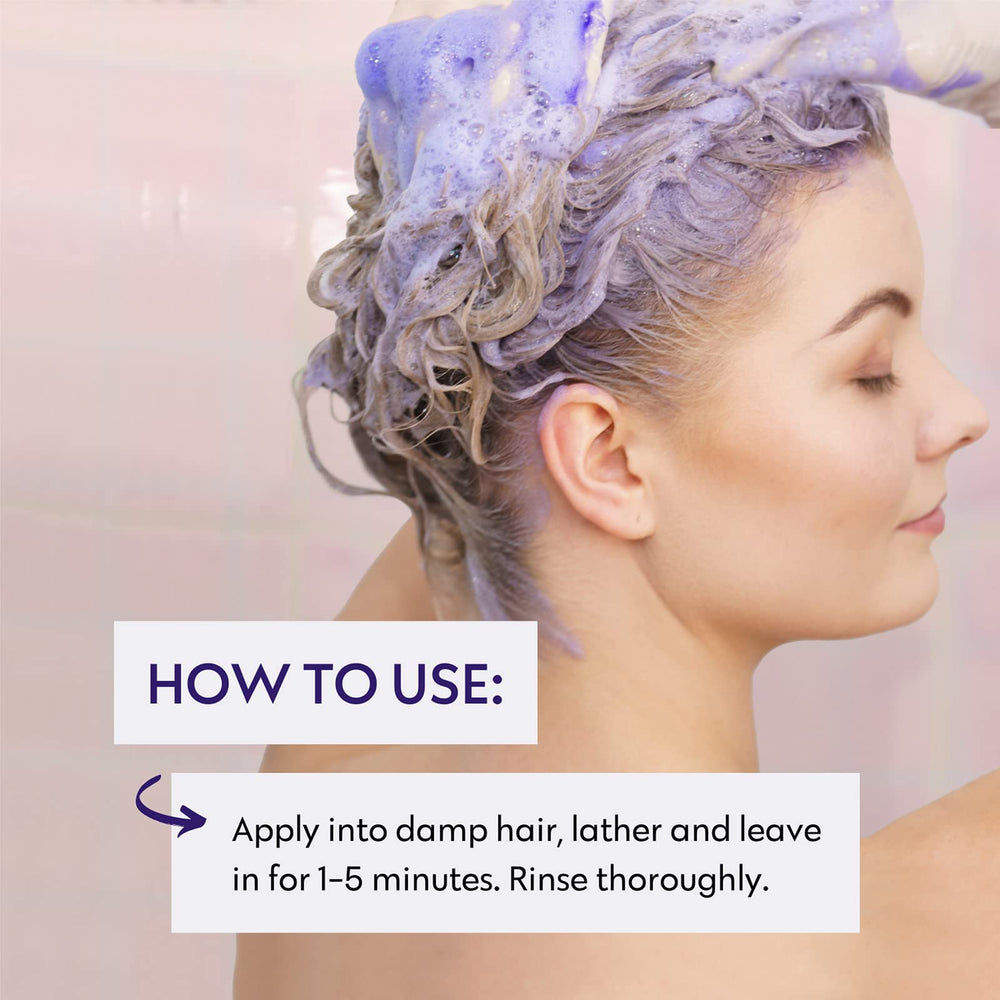 Hands applying No Nothing shampoo, fragrance-free care for sensitive scalps.