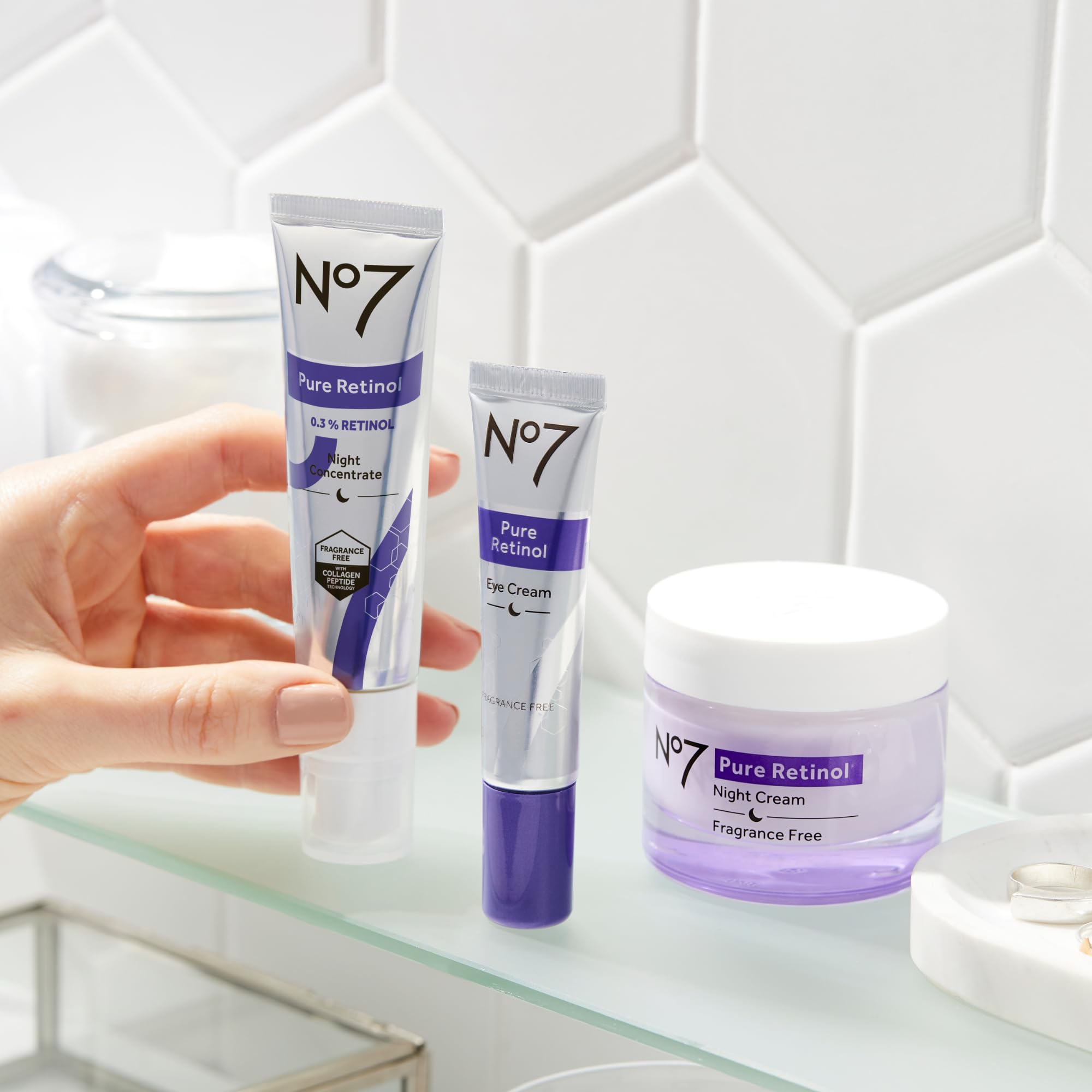 Hand applying No7 product demonstrating correct application for targeted treatment
