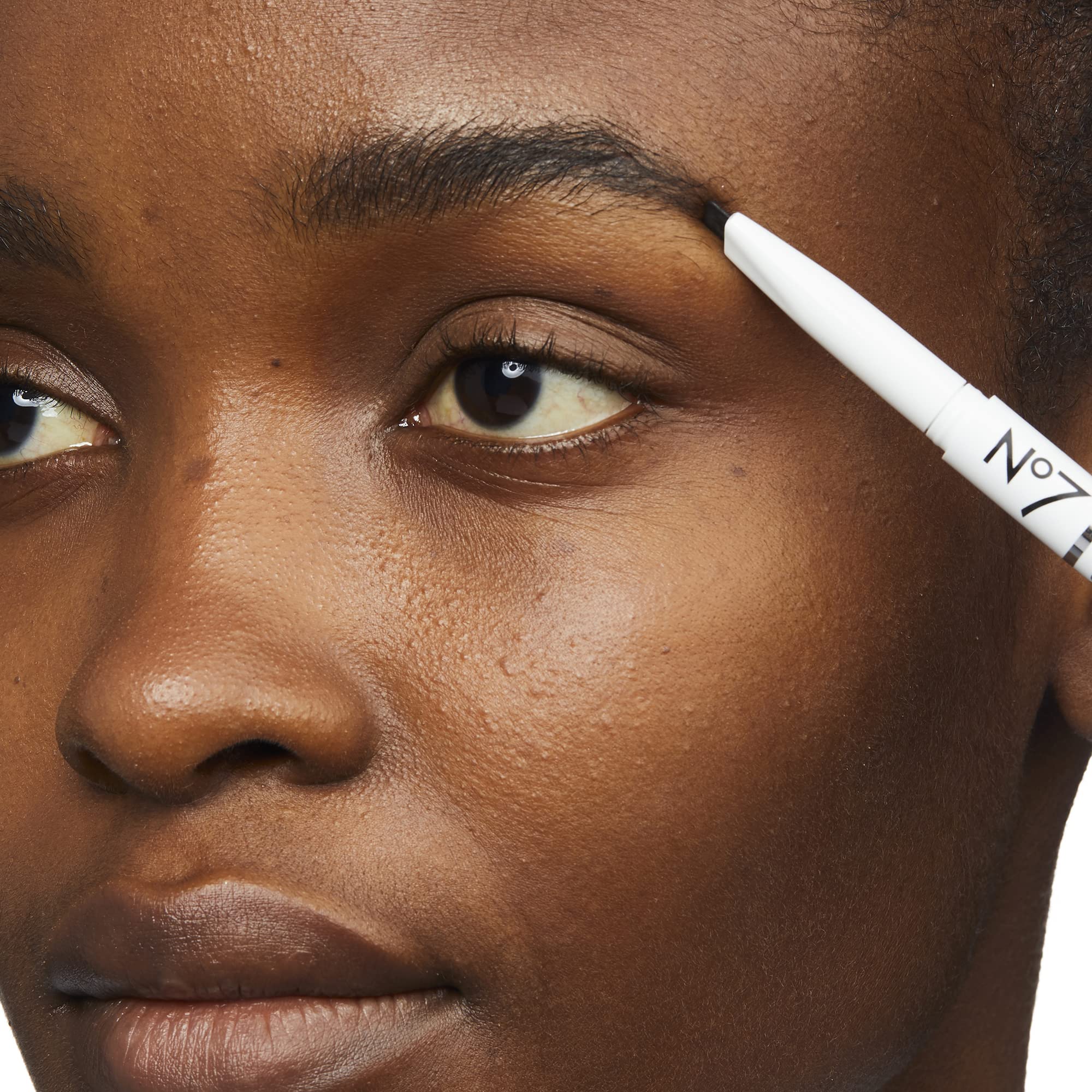 No7 swatch strokes on skin demonstrating fine hair-like application