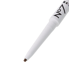 No7 pencil swatch on skin showing buildable light brown color