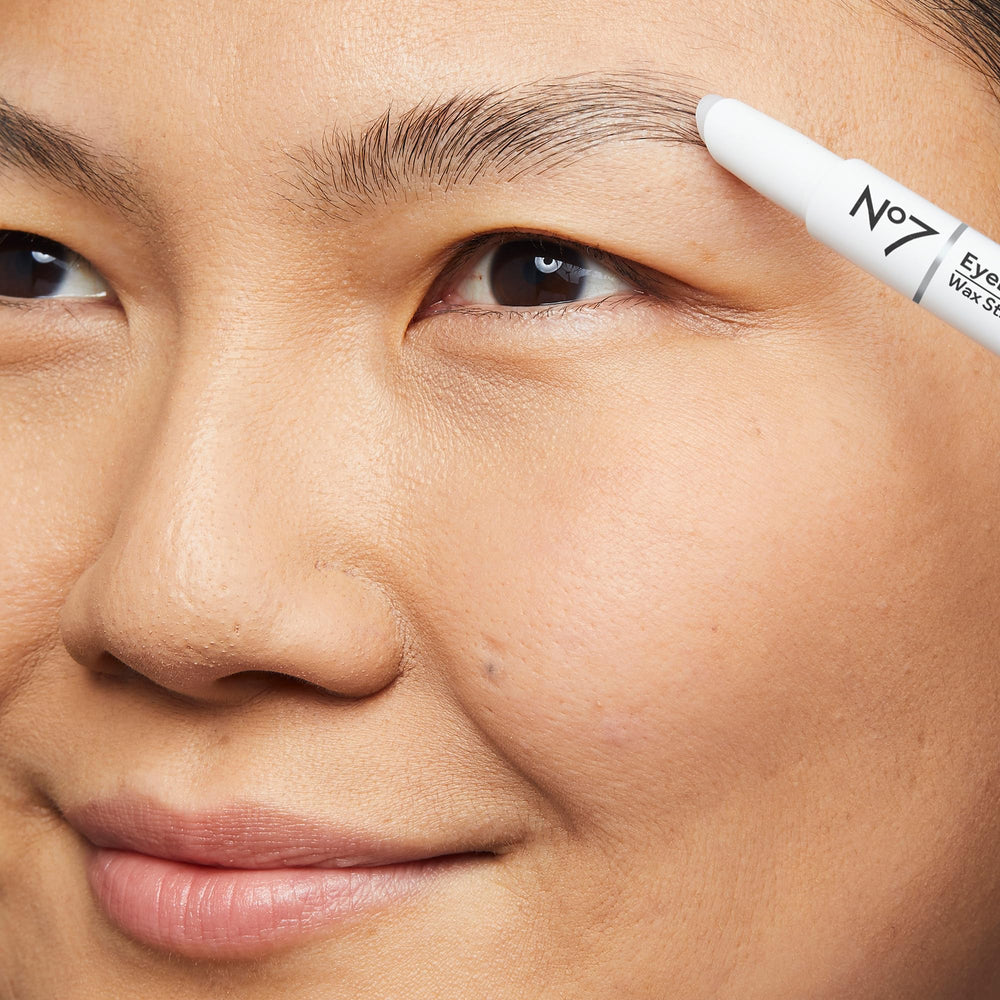 No7 brow wax stick applied on model demonstrating natural volumized brows
