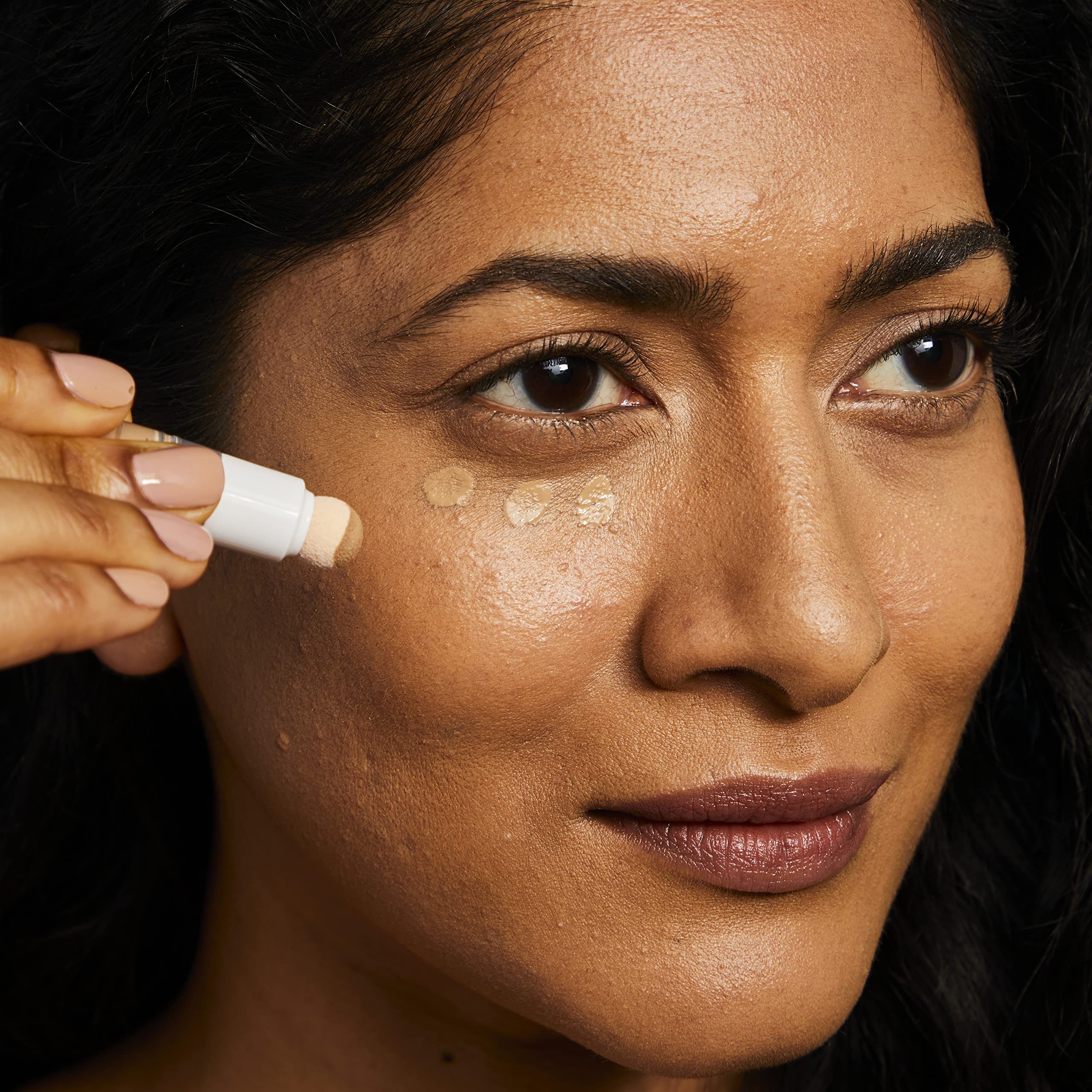 No7 product in use under-eye demonstrating brightening effect and coverage benefit