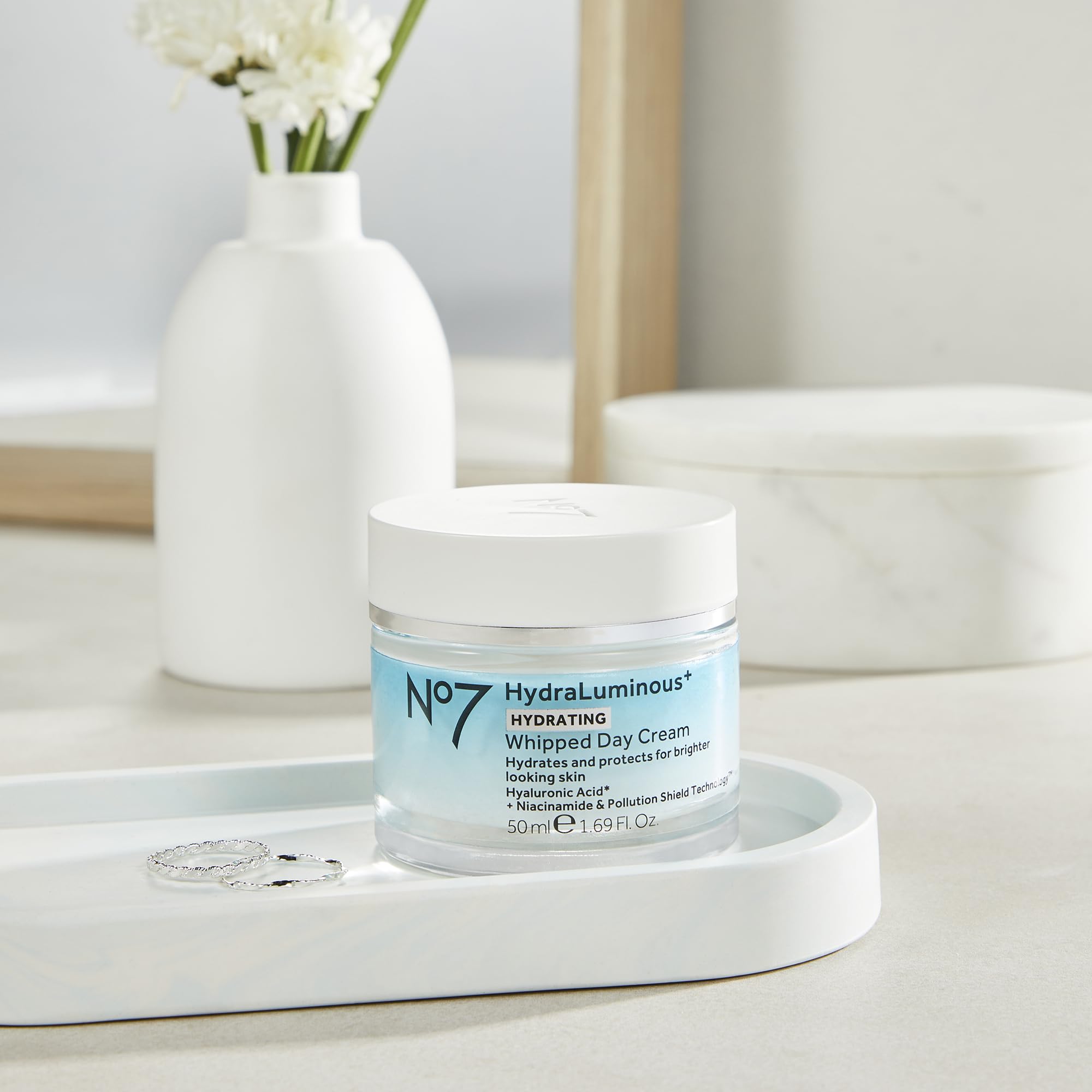 No7 HydraLuminous face and neck massage promotes even absorption with upward strokes