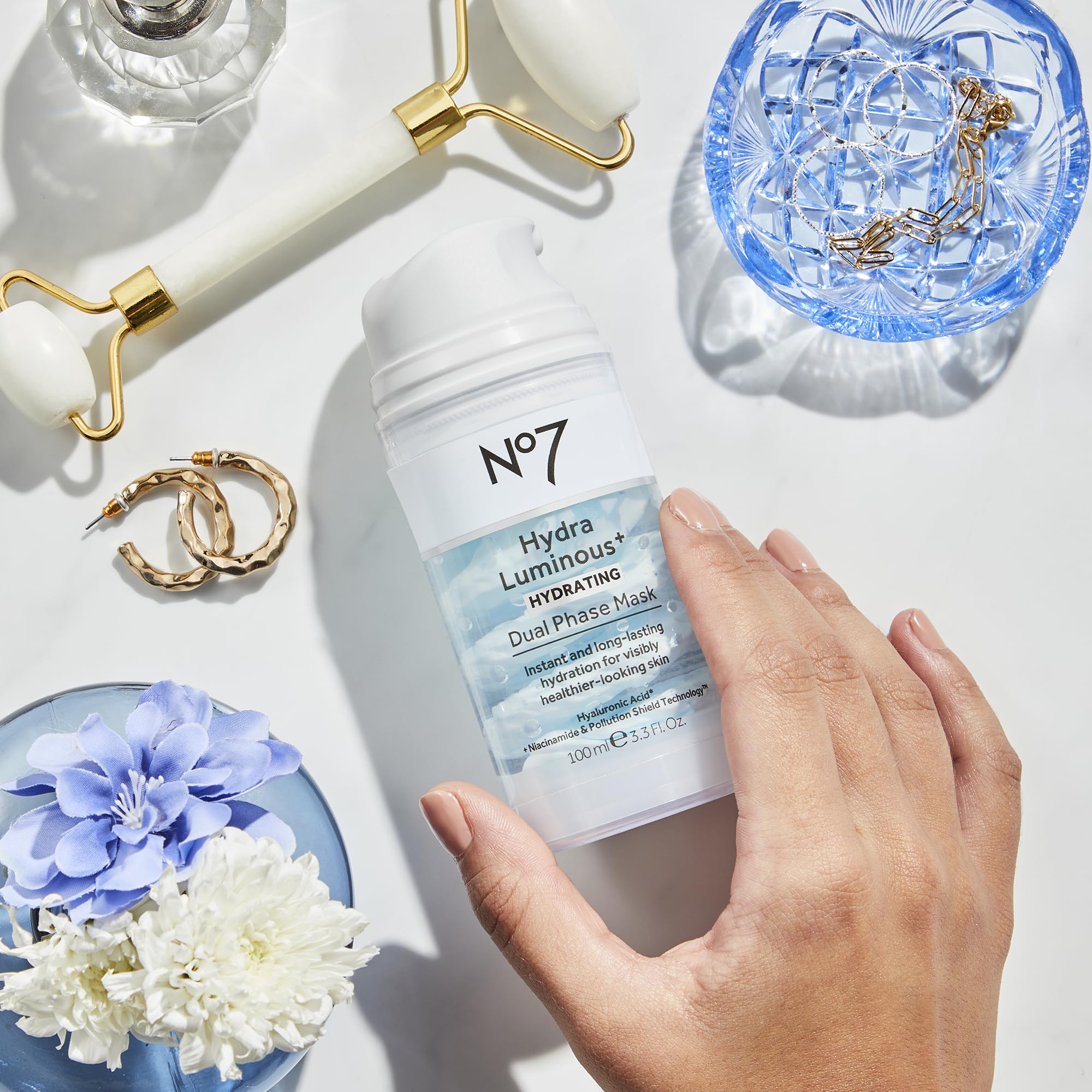 No7 product next to hand for scale showing the 3.5 fl oz size convenience