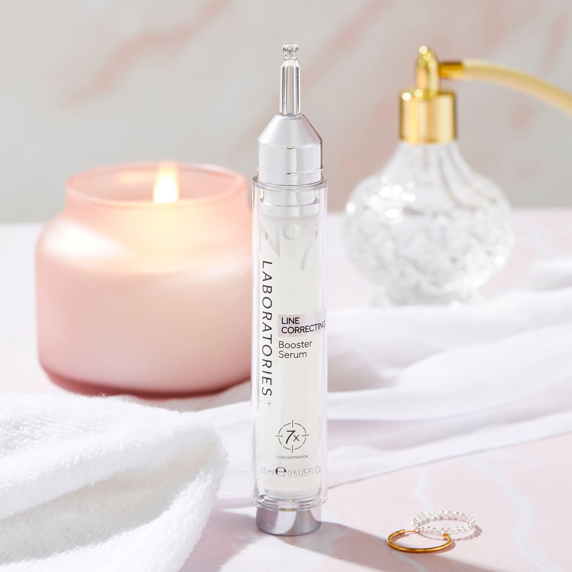 No7 Laboratories Line Correcting Booster Serum texture on skin shows deep hydration effect.