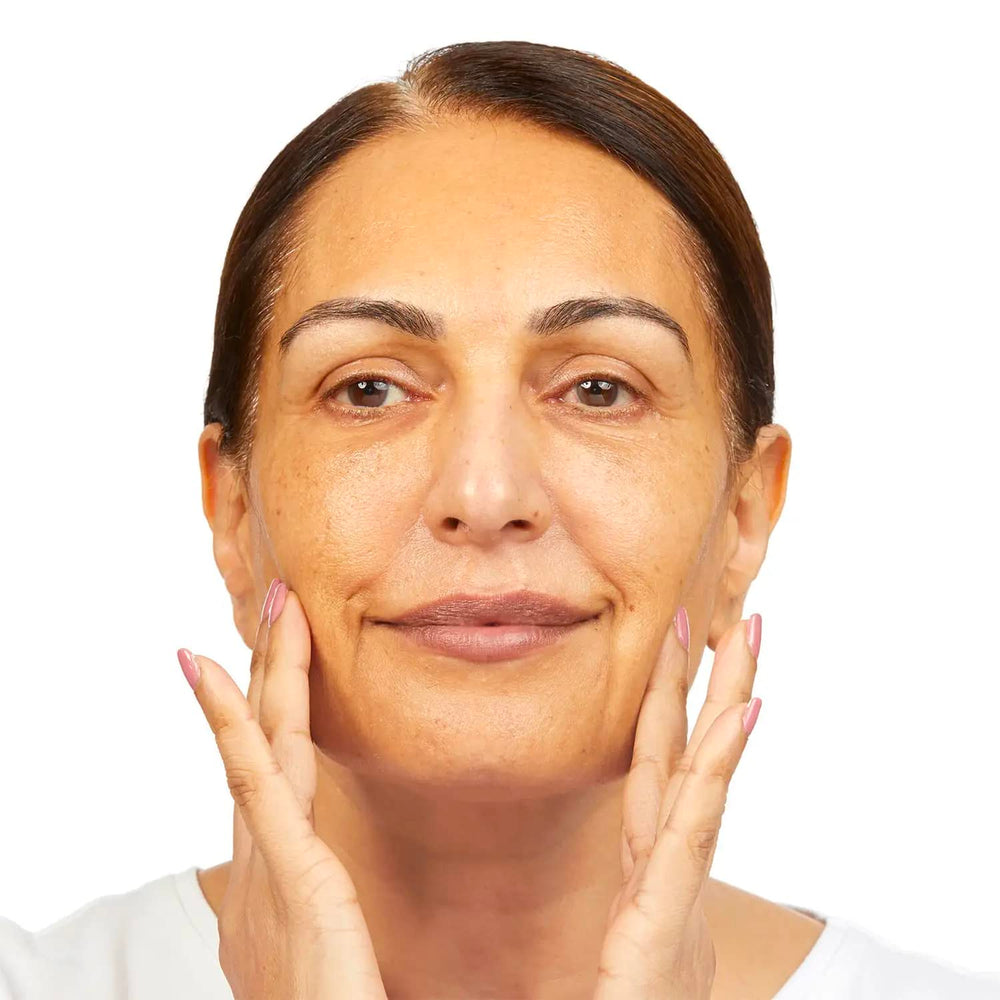 No7 cleansing lotion on fingers demonstrating easy application