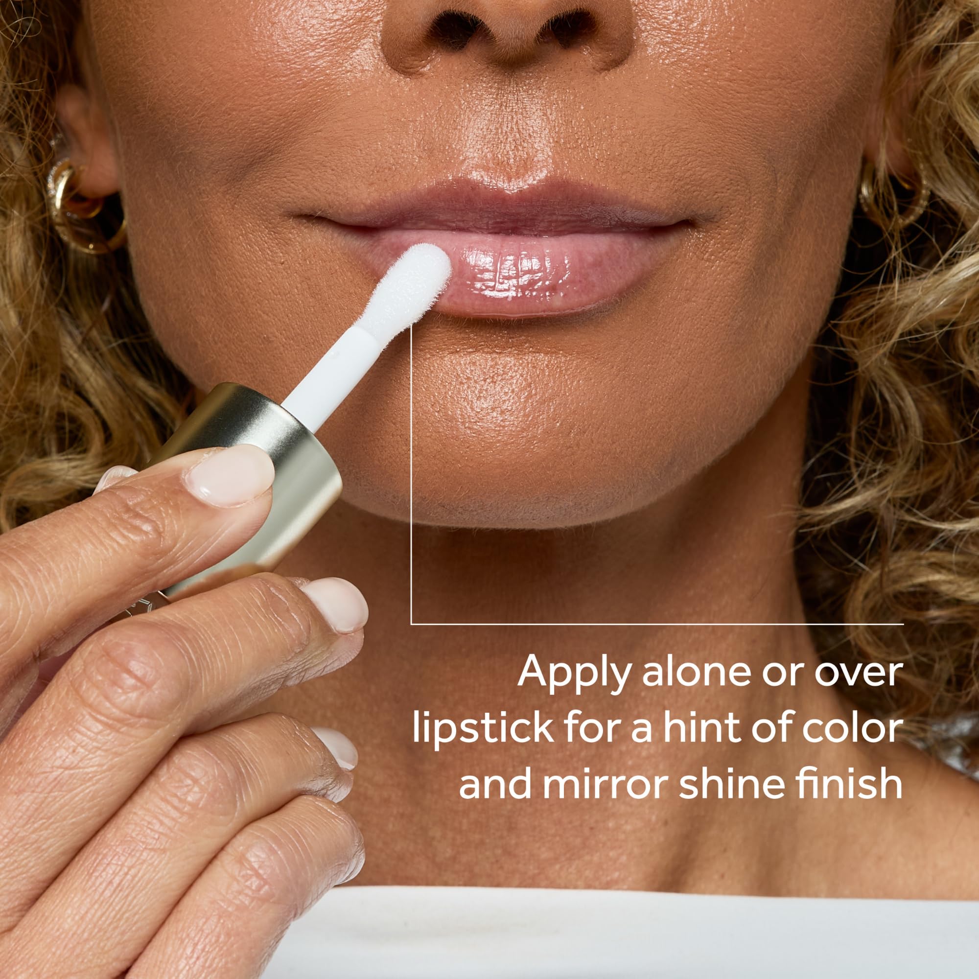 Model wearing No7 lip oil showing hydrated, reflective lips benefit