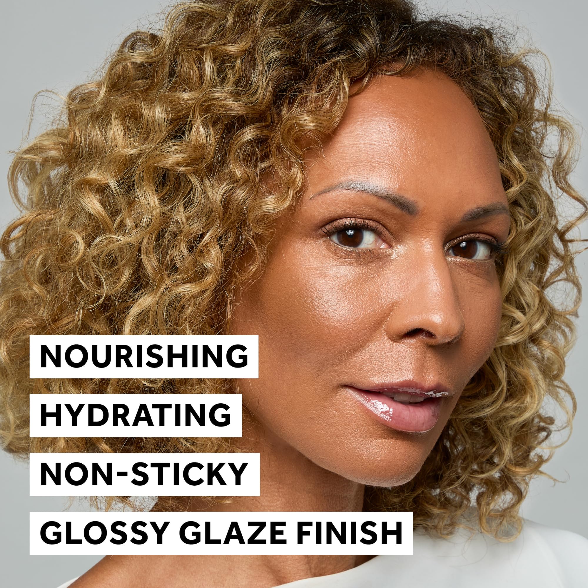 No7 Pro Artist Lip Oil next to a coin showing compact travel-friendly size