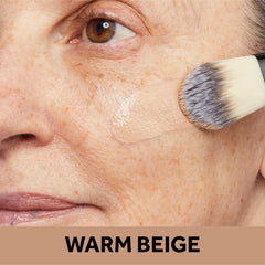 Swirl of No7 Protect & Perfect Foundation Warm Beige on hand for buildable coverage