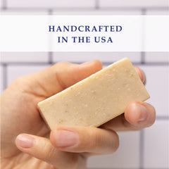 Noble Formula bar soap with milled oats for gentle exfoliation.