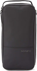 NOMATIC toiletry bag open compartments showcases organized sections for brushes and tubes.