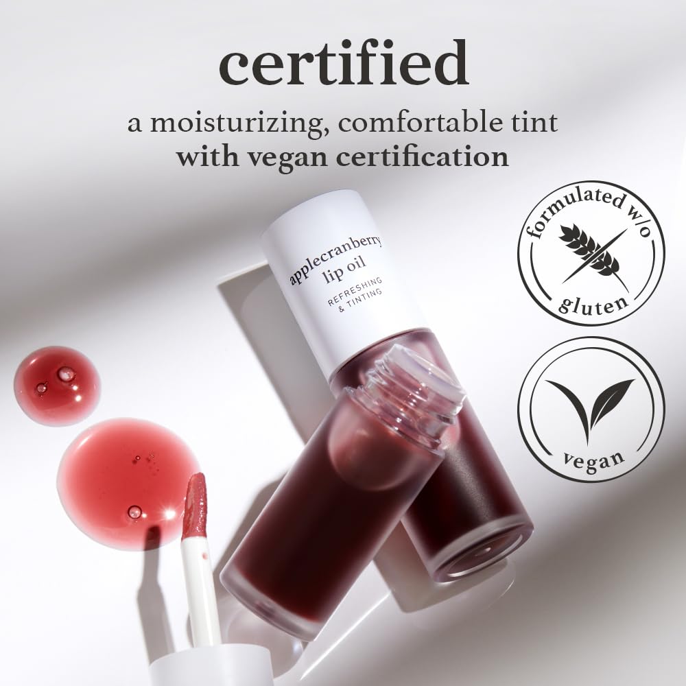 NOONI Applecranberry Lip Oil swatch reveals natural color and glossy finish.