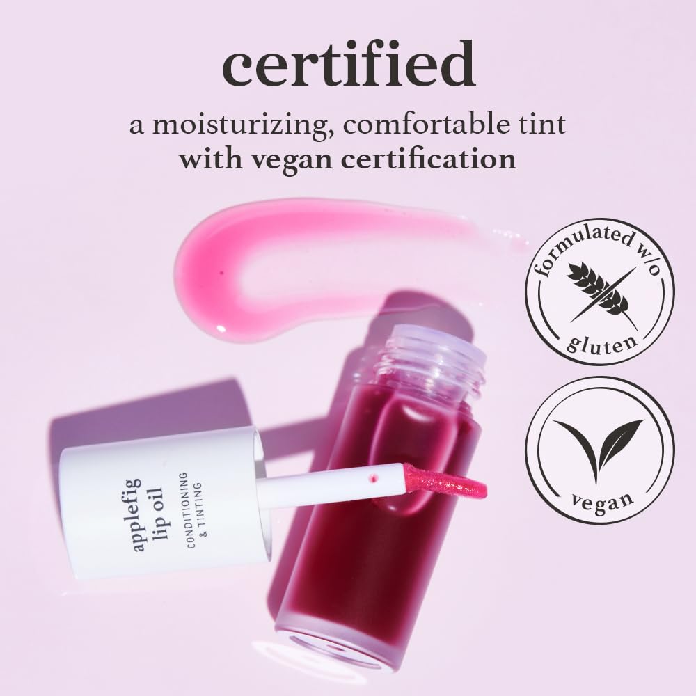 NOONI Applefig lip oil with glossy finish that enhances lips' fullness.