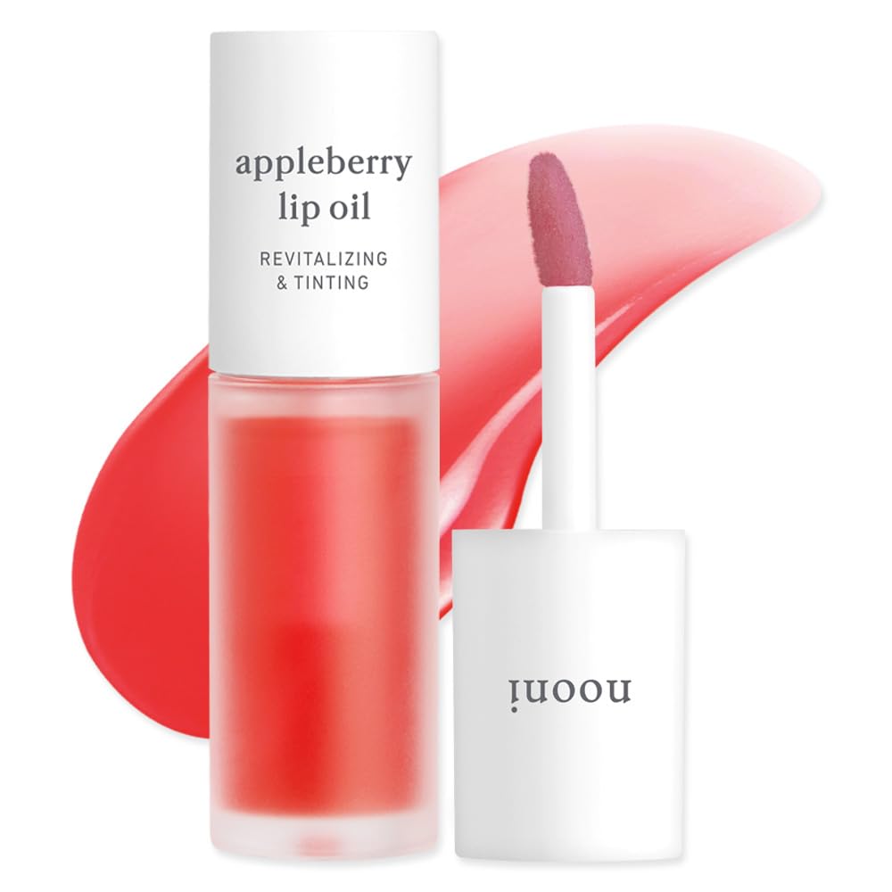 NOONI Appleberry lip oil tube closeup with glossy hydration and subtle tint.