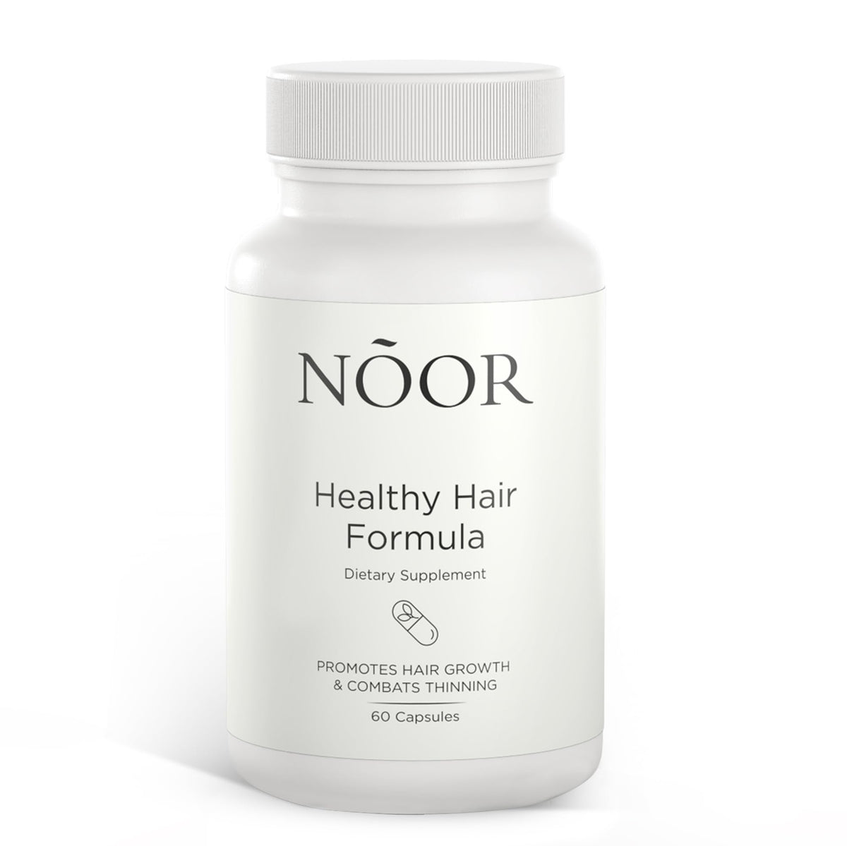 NOOR HAIR Healthy Hair Formula bottle on a clean surface for daily growth support