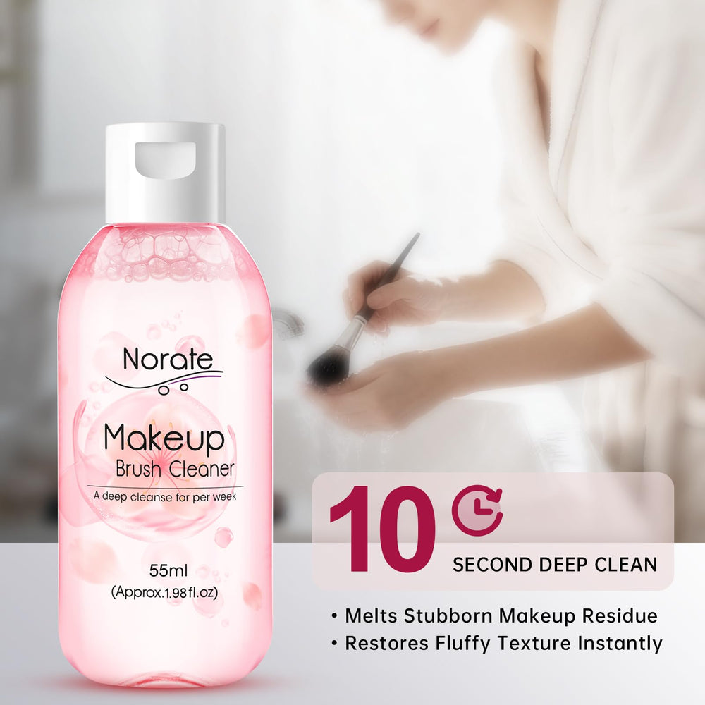 Norate makeup brush cleaner sponge in use with brushes for thorough cleaning.