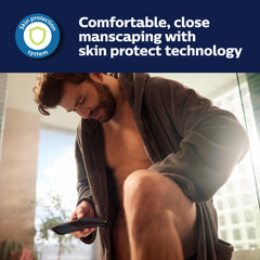 Norelco Bodygroom 7000 adjustable comb demonstrates 3-11 mm length options for precise grooming.