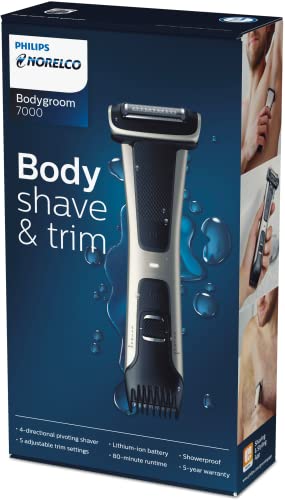 Norelco Bodygroom 7000 cleaning brush supports easy maintenance after shower use.