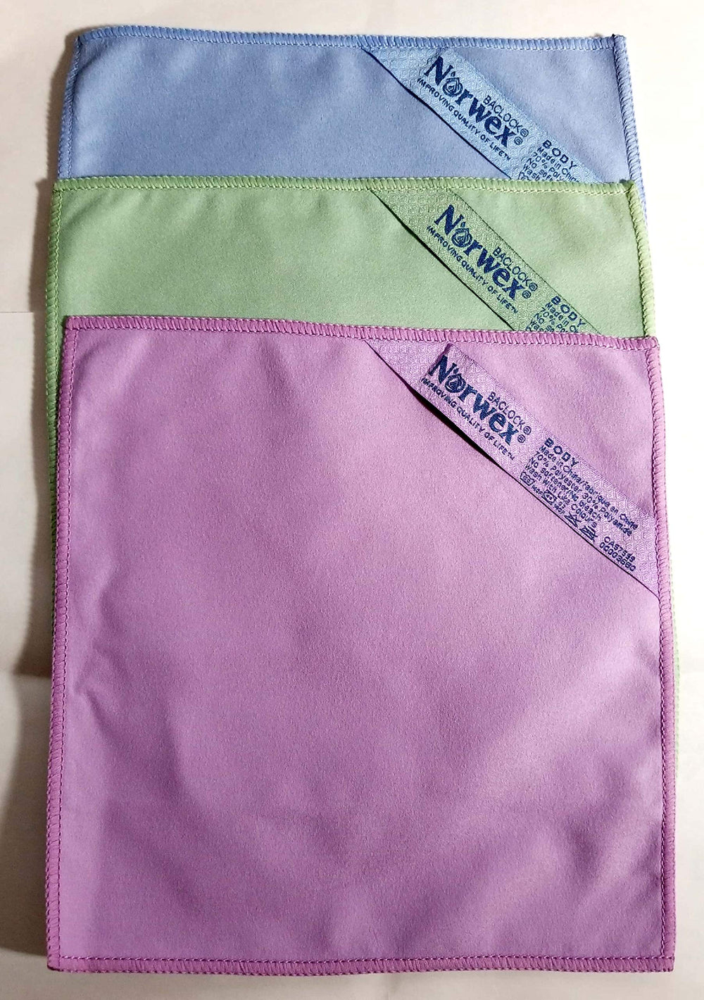 Norwex suede makeup remover face cloth set in blue, purple, green for gentle makeup removal without cleansers