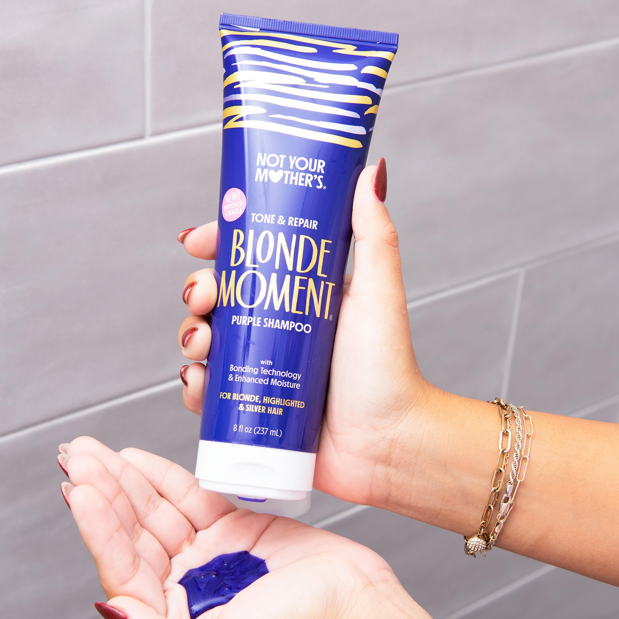 Not Your Mother's Blonde Moment Purple Conditioner bottle for hydrating repair.