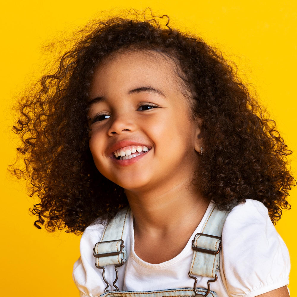 Not Your Mother's Kids Curly Care Detangler Spray eases tangles for quick morning styling
