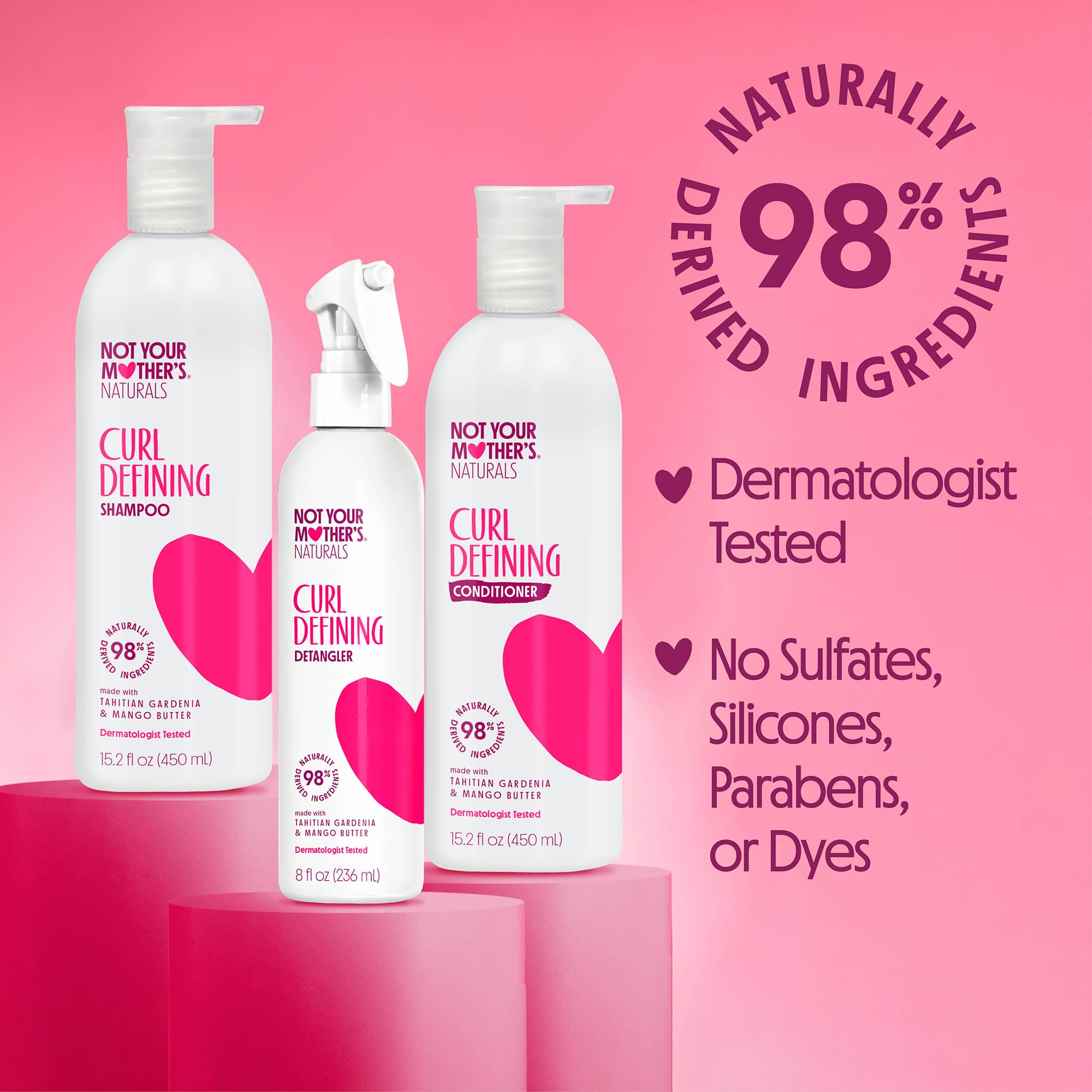 Not Your Mother's Naturals detangler being combed through damp hair.