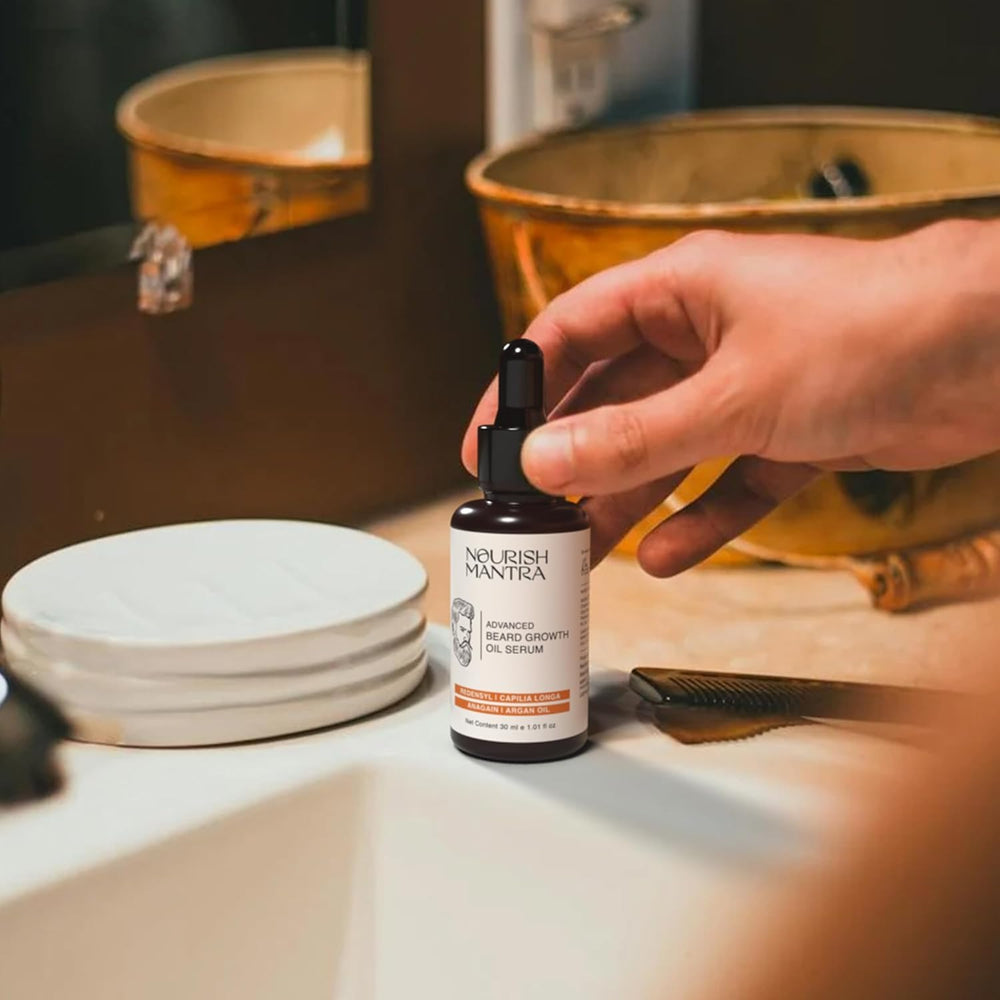 nourish-mantra beard oil application on the face demonstrates an easy grooming routine.