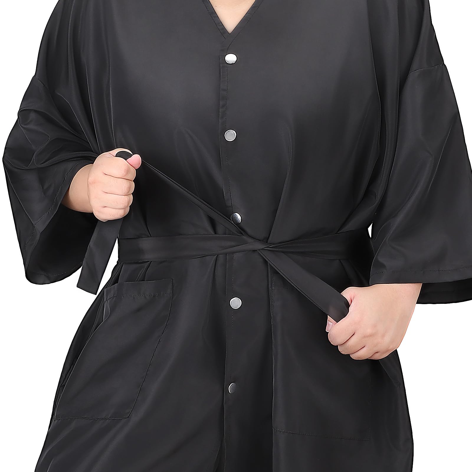 Noverlife cape pockets close-up shows two large 7.8x7 inch pockets.