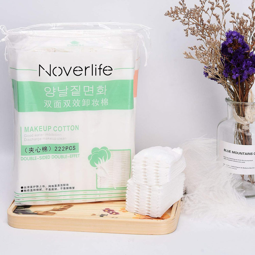Noverlife two-sided pads showing exfoliation and softness in one cotton square