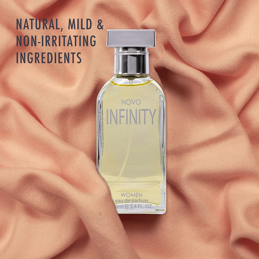 NovoGlow Infinity for Women on wrist during application demonstrating lasting scent.