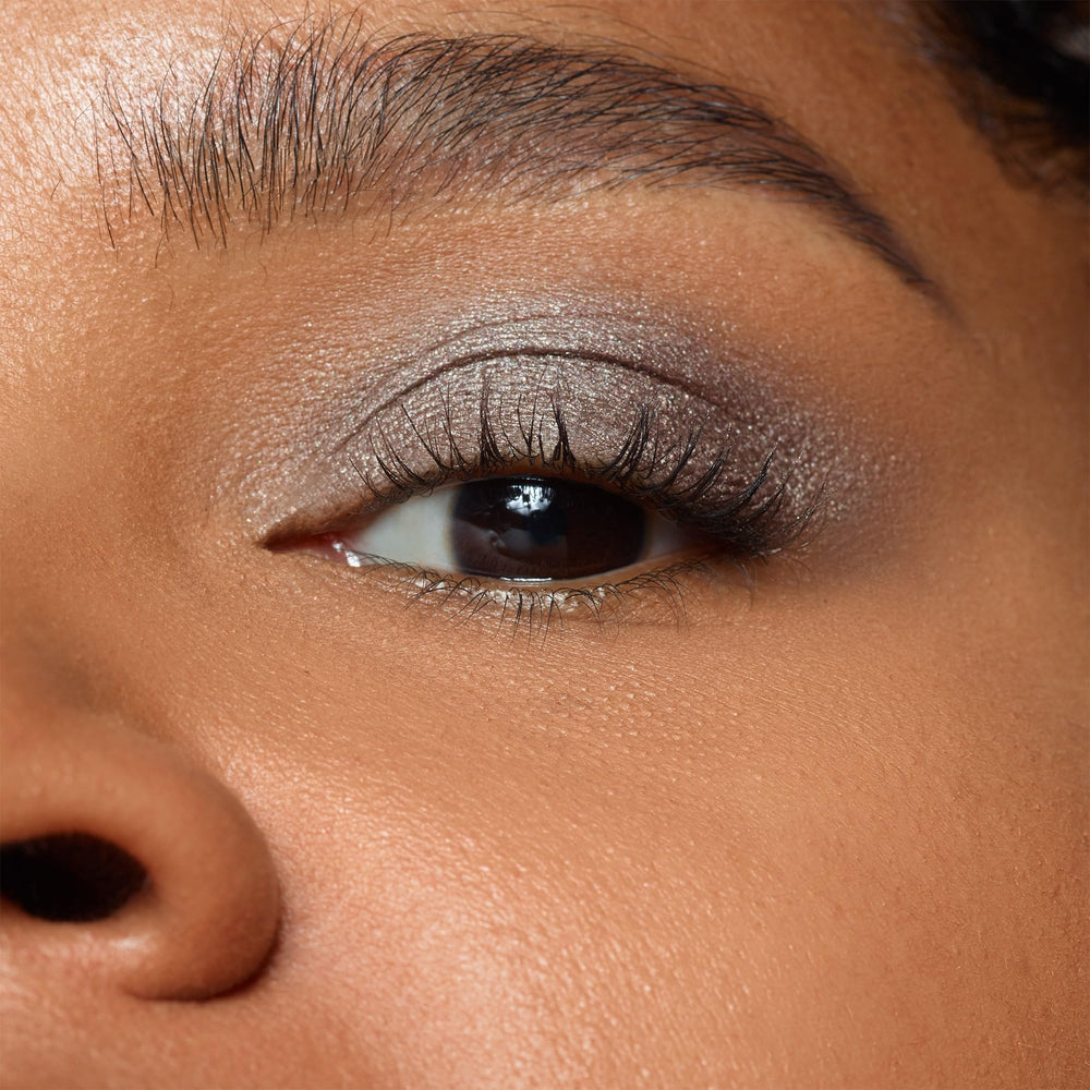 Nudestix Magnetic Luminous Eye Color Smoke swatches on arm demonstrating long-wear shade