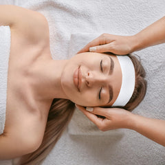 Nujzuir elastic facial headband closeup showing stretchable fit for makeup sessions.