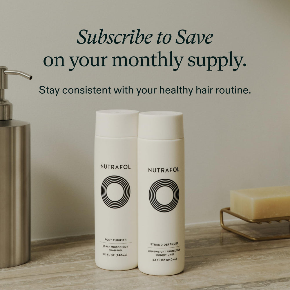 Nutrafol conditioner on bathroom shelf staged with towel to show lifestyle placement and daily routine fit