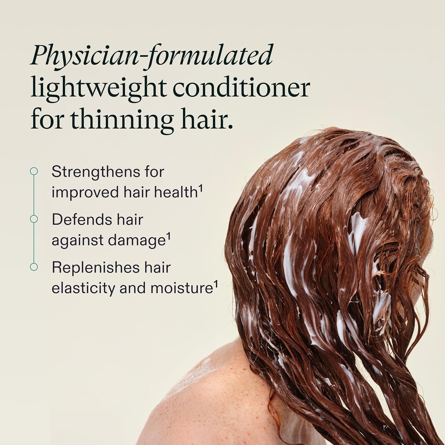 Creamy conditioner texture on fingers, Nutrafol demonstrating lightweight moisturizing feel