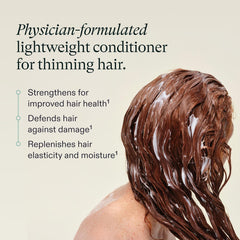 Creamy conditioner texture on fingers, Nutrafol demonstrating lightweight moisturizing feel