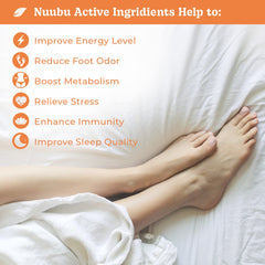 Nuubu foot pads on feet during night use for calm, restorative sleep