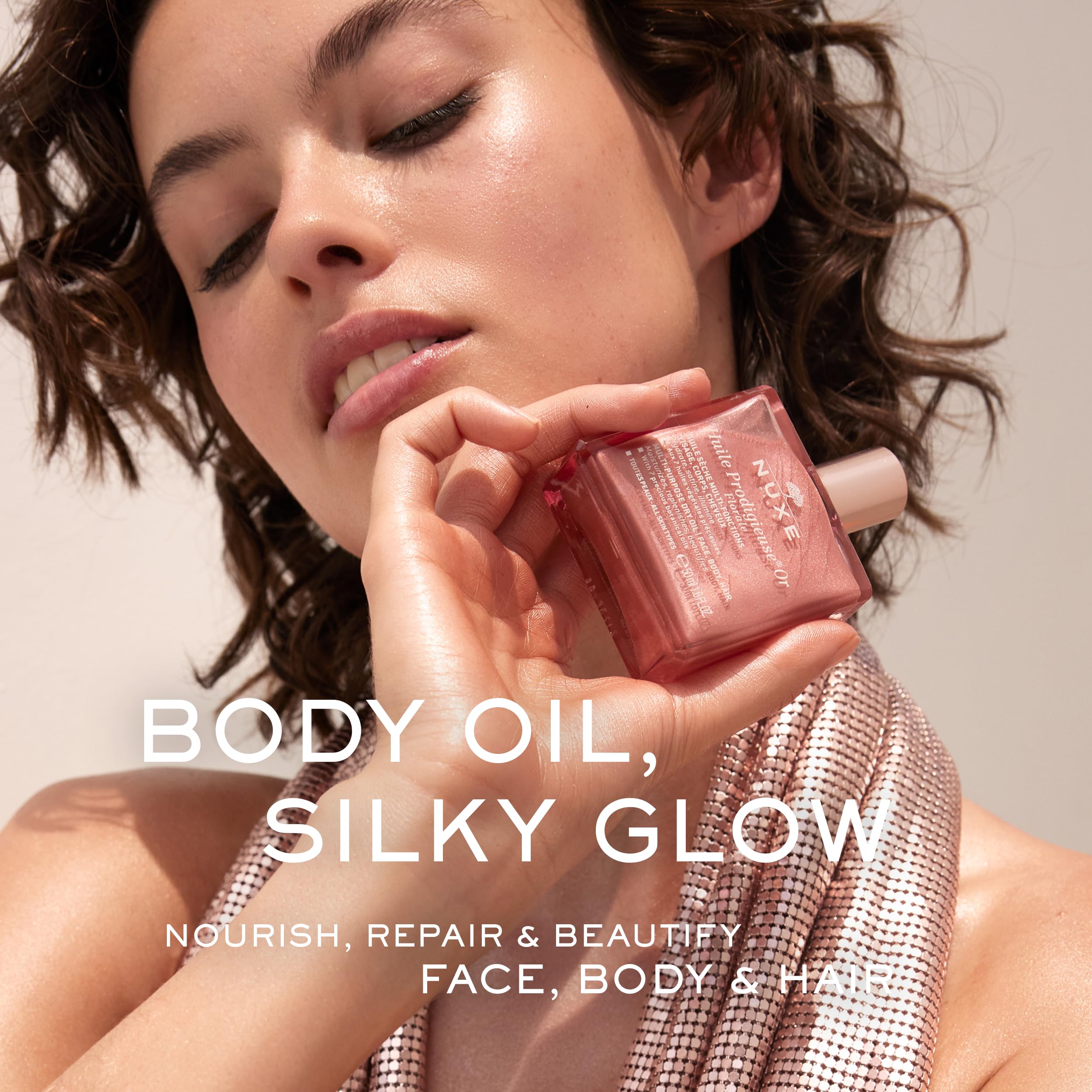 Nuxe Huile Prodigieuse Florale on skin delivers rosy-gold glow.