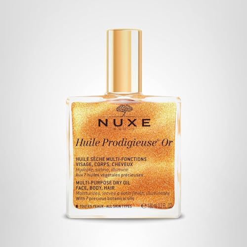 Nuxe Huile Prodigieuse Shimmer bottle close-up shows pearl shimmer particles.