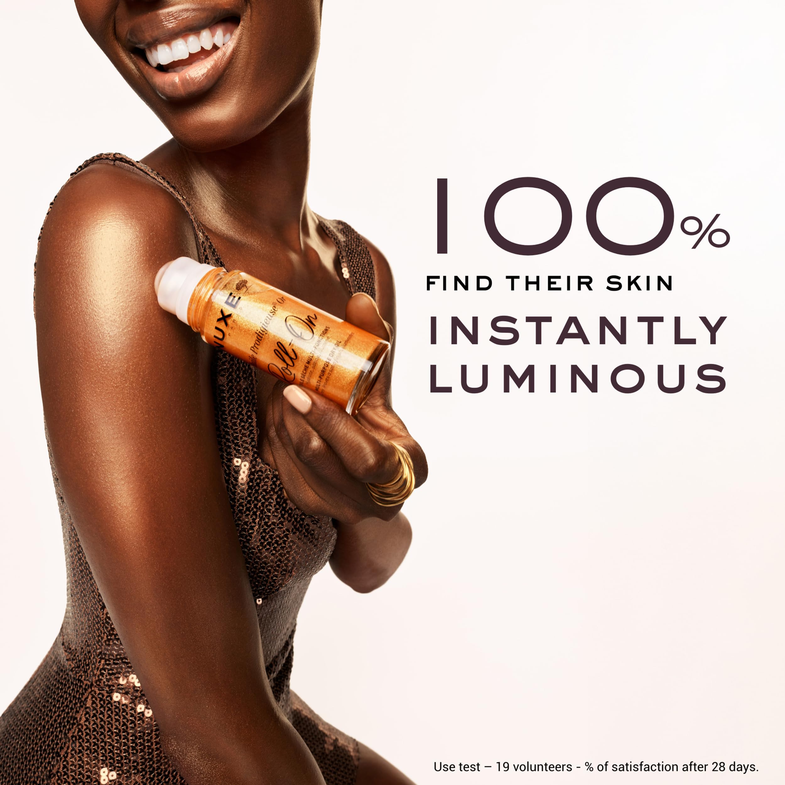 Nuxe Huile Prodigieuse Shimmer Roll-On body glow adds subtle sheen to skin.