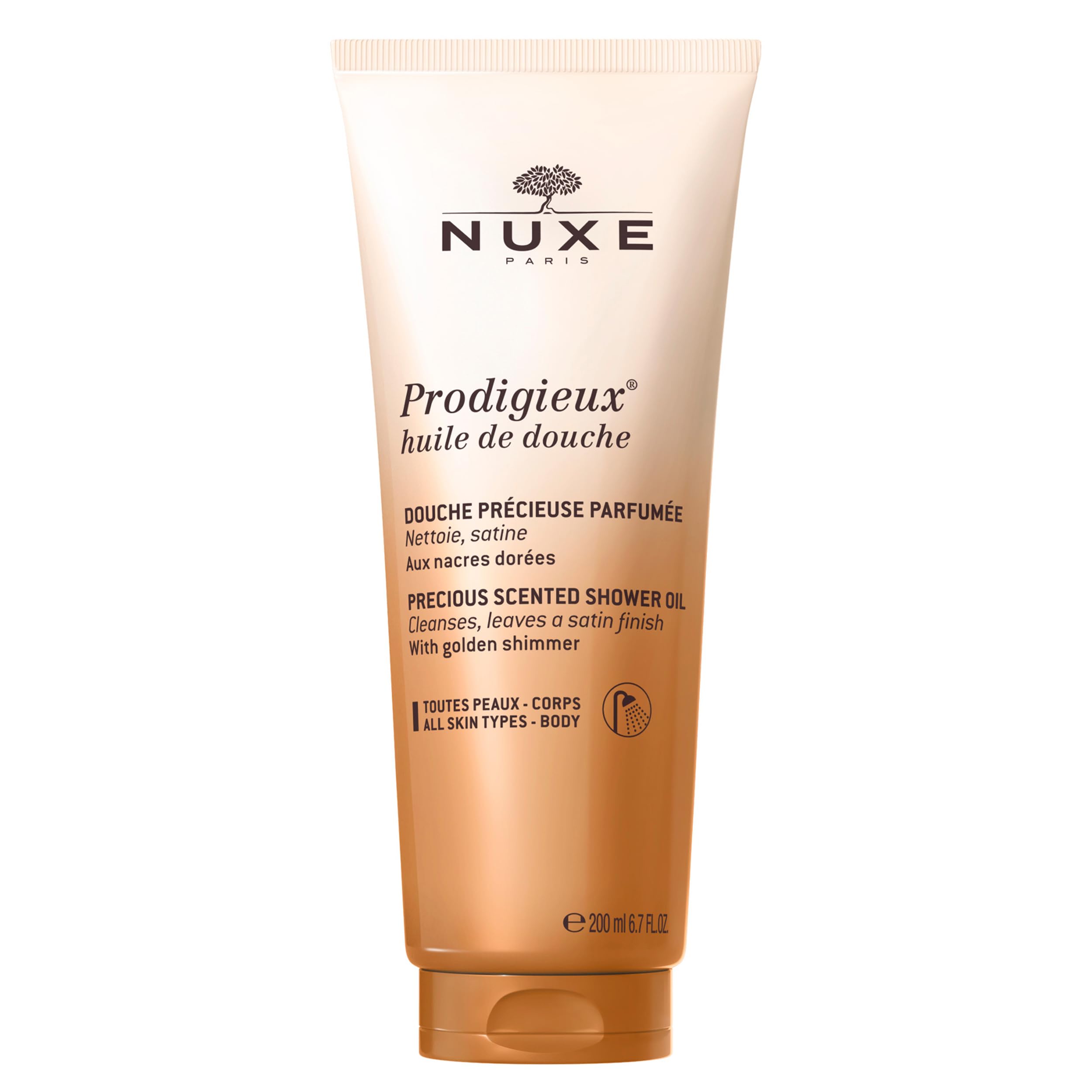 Nuxe Prodigieux gel de ducha vegano en botella dorada, piel suave.
