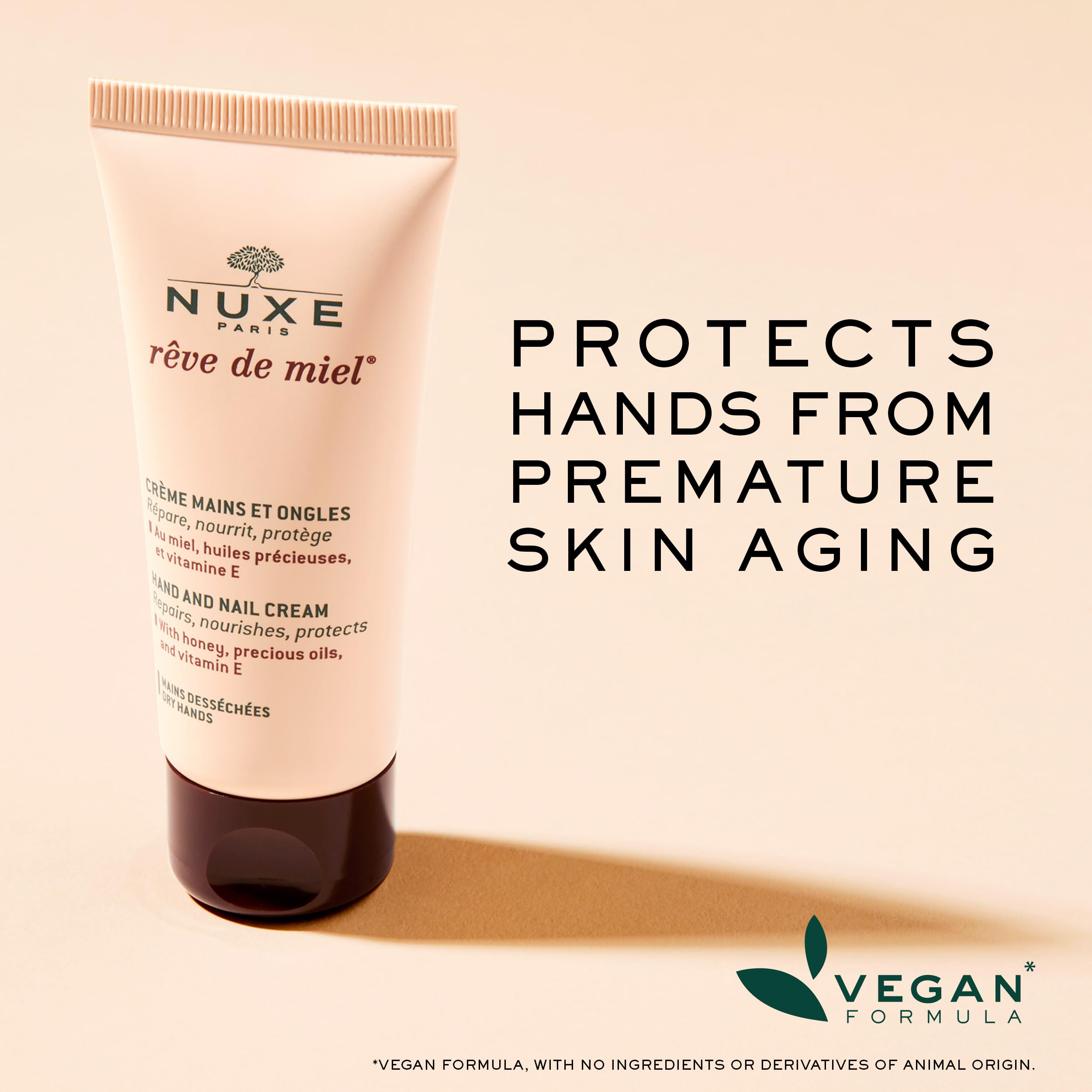 Nuxe Rêve de Miel hand cream being applied for soothing relief.