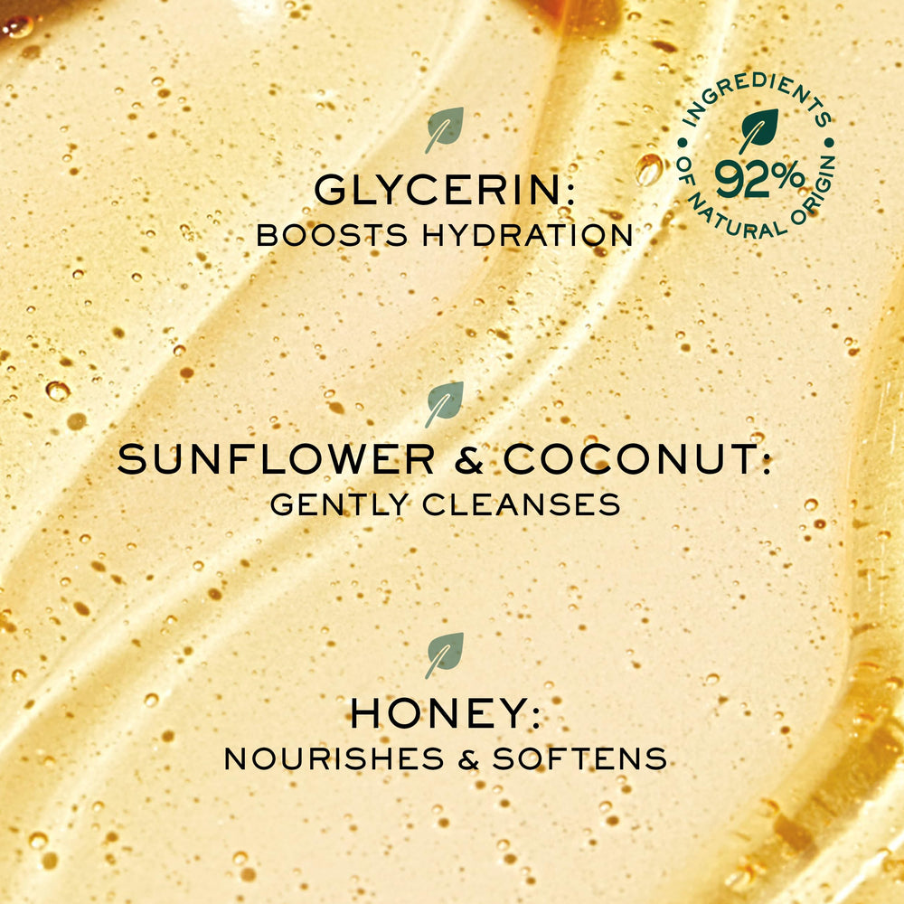 Nuxe Rêve de Miel packaging with honey droplets, emphasizing indulgent shower experience.